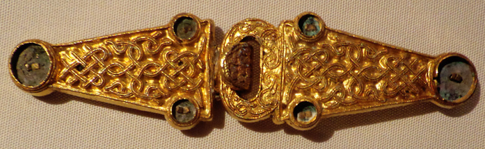 Sword belt, Anglo-Saxon, early AD 600s. Gold belt buckle, inlaid with garnets and a pair of clasps. Example of the finest in early medieval craftsmanship. Found in a grave mound in Taplow, Buckinghamshire in the 1880's.