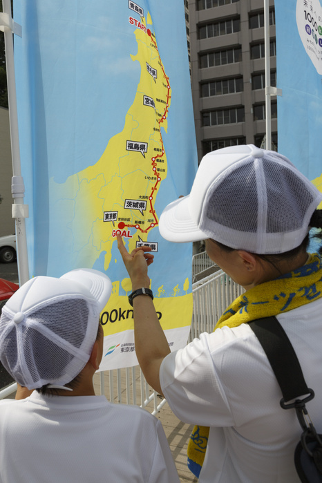 1000km Relay to Tokyo 2018 Participants look at a banner of the   1000km Relay to Tokyo 2018   relay race in Fukushima on August 2, 2018, Japan. The annual event organized by the Tokyo Metropolitan Government, Tokyo Sports Association and Tokyo Athletic Association showcases the recovery efforts in Tohoku area affected by the 2011 Great East Japan Earthquake. The 15 day relay from Aomori Prefecture to Tokyo is split into short 1 2km segments to encourage maximum participation.  Photo by Rodrigo Reyes Marin AFLO 