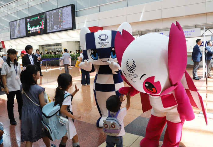 Tokyo 2020 Olympic and Paralympic Games Two Years Before the Opening of the Games August 19, 2018, Tokyo, Japan   Tokyo 2020 Olympics and Paralympics mascots Miraitowa  L  and Someity  R  greet tourists at an event two years before of the Tokyo 2020 Paralympics at the Haneda airport in Tokyo on Sunday, August 19, 2018. All Nippon Airways  ANA  will support the Tokyo 2020 Olympic and Paralympic Games and demonstrated the blind football for the toursist at the airport.             Photo by Yoshio Tsunoda AFLO  LWX  ytd  