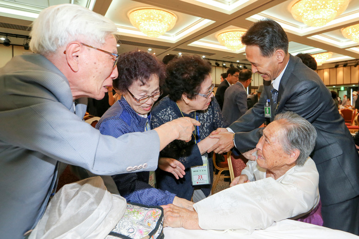 South and North Korean family reunion in Mount Kumgang Inter Korean Family Reunion, Aug 24, 2018 : North Korean Ri Sook Hee  front R, 90  meets her South Korean younger brother Lee Yong Hee  L, 89  during their family reunion at Kumgangsan hotel in Mt. Kumgang resort, North Korea in this picture taken by Joint Press Corps at Mt. Kumgang and handouted by the South Korean Ministry of Unification. A total of 326 South Korean people from 81 families crossed the Demilitarized Zone separating the two Koreas on August 24 to meet their North Korean family members for the first time since they were mostly separated by the 1950 53 Korean War, during a three day inter Korean family reunion untill August 26. About 57,000 South Koreans in their 70s or older are waiting to see their family members who might be living in the North, local media reported. Picture taken on August 24, 2018. EDITORIAL USE ONLY.  Photo by Joint Press Corps at Mt. Kumgang The South Korean Ministry of Unification Handout   NORTH KOREA 