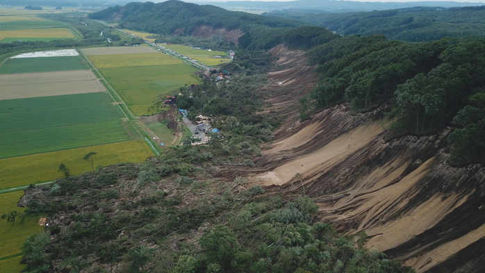 Magnitude 7 earthquake in Hokkaido HOKKAIDO, JAPAN   SEPTEMBER 07: Photo taken on September 7, 2018 shows an aerial view of the massive landslide that destroys several homes and killing at least nine people and leaving dozens of people still missing in Atsuma town, Hokkaido, northern Japan. A powerful Magnitude 7 earthquake hit wide areas of Hokkaido early Thursday, triggering landslides as well as causing the loss of power.  Photo: Richard Atrero de Guzman Aflo  