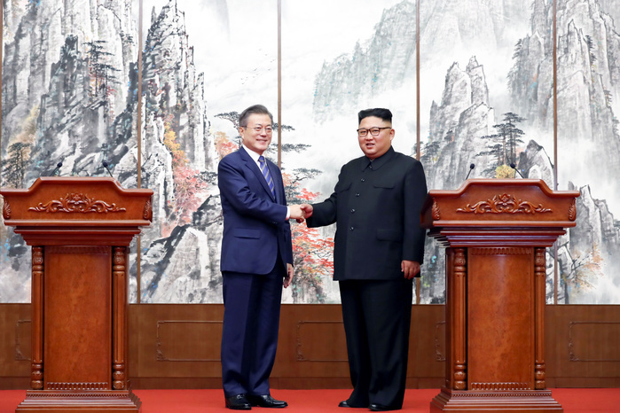 Inter Korean Summit in Pyongyang  Inter Korean Summit, Sep 19, 2018 : North Korean leader Kim Jong Un and South Korean President Moon Jae In shake hands after a joint press conference following their summit at the Paekhwawon State Guest House in Pyongyang, North Korea. North Korean leader Kim agreed to permanently dismantle major missile engine test facilities and a launch pad near its border with China. The two Koreas agreed to intensify cross border exchange and work together for balanced economic development on the Korean Peninsula and agreed to break ground for a joint project to connect railways and roads across their borders within this year as part of efforts to beef up inter Korean cooperation, local media reported. EDITORIAL USE ONLY  Photo by Pyeongyang Press Corps Pool AFLO   NORTH KOREA 