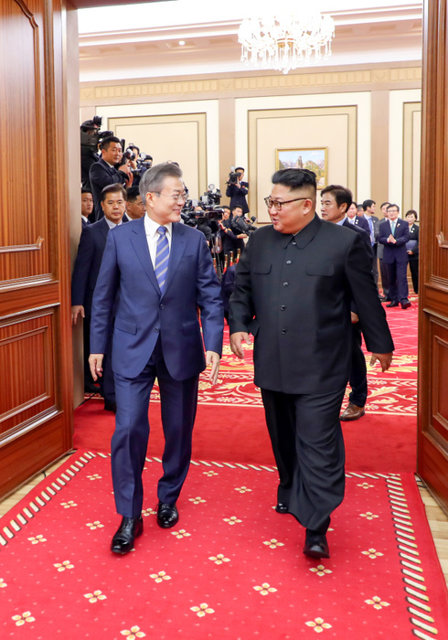 Inter Korean Summit in Pyongyang  Inter Korean Summit, Sep 19, 2018 : North Korean leader Kim Jong Un and South Korean President Moon Jae In leave together after a joint press conference following their summit at the Paekhwawon State Guest House in Pyongyang, North Korea. North Korean leader Kim agreed to permanently dismantle major missile engine test facilities and a launch pad near its border with China. The two Koreas agreed to intensify cross border exchange and work together for balanced economic development on the Korean Peninsula and agreed to break ground for a joint project to connect railways and roads across their borders within this year as part of efforts to beef up inter Korean cooperation, local media reported. EDITORIAL USE ONLY  Photo by Pyeongyang Press Corps Pool AFLO   NORTH KOREA 