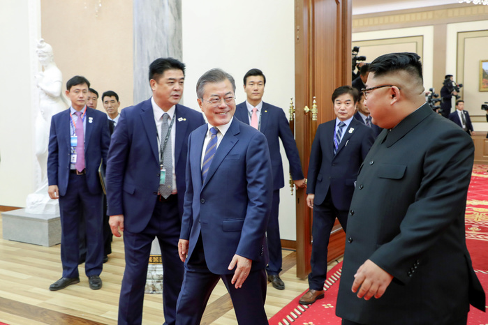 Inter Korean Summit in Pyongyang  Inter Korean Summit, Sep 19, 2018 : North Korean leader Kim Jong Un and South Korean President Moon Jae In leave together after a joint press conference following their summit at the Paekhwawon State Guest House in Pyongyang, North Korea. North Korean leader Kim agreed to permanently dismantle major missile engine test facilities and a launch pad near its border with China. The two Koreas agreed to intensify cross border exchange and work together for balanced economic development on the Korean Peninsula and agreed to break ground for a joint project to connect railways and roads across their borders within this year as part of efforts to beef up inter Korean cooperation, local media reported. EDITORIAL USE ONLY  Photo by Pyeongyang Press Corps Pool AFLO   NORTH KOREA 