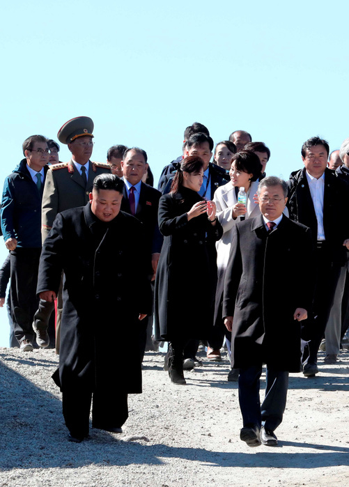 Inter Korean Summit in Pyongyang  Inter Korean Summit, Sep 20, 2018 : North Korean leader Kim Jong Un and South Korean President Moon Jae In visit the top of Mount Paekdu, northeast of Pyongyang, North Korea. North Korean leader Kim and South Korean President Moon visited Mount Paekdu, the highest peak of the Korean Peninsula which is considered the birthplace of the Korean people in a symbolic gesture showing their commitment to reconciliation, local media reported. EDITORIAL USE ONLY  Photo by Pyeongyang Press Corps Pool AFLO   NORTH KOREA 