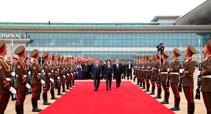 Inter Korean Summit in Pyongyang  Inter Korean Summit, Sep 20, 2018 : South Korean President Moon Jae In, South Korean first lady Kim Jung Sook and North Korea s nominal head of state Kim Yong Nam  R  inspect honour guard at the Pyongyang Sunan International Airport in Pyongyang before Moon and his wife Kim leave to the Samjiyon Airport in Samjiyon county near Mount Paekdu, North Korea. North Korean leader Kim Jong Un and Moon visited the top of Mount Paekdu, the highest peak of the Korean Peninsula which is considered the birthplace of the Korean people in a symbolic gesture showing their commitment to reconciliation, local media reported. EDITORIAL USE ONLY  Photo by Pyeongyang Press Corps Pool AFLO   NORTH KOREA 