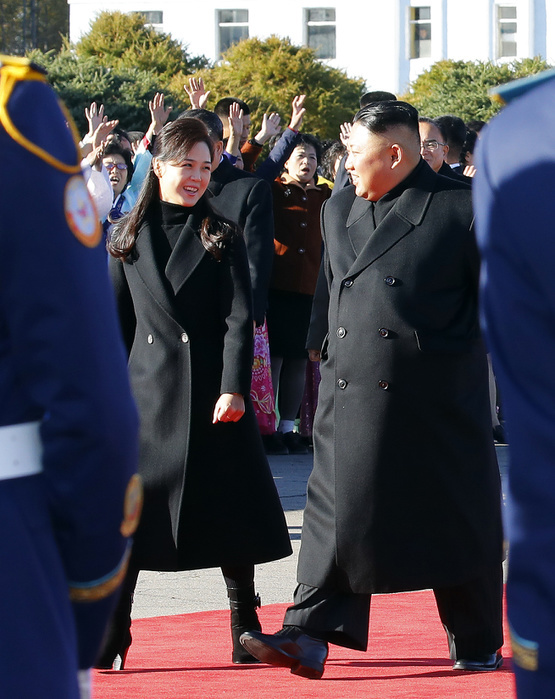 Inter Korean Summit in Pyongyang  Inter Korean Summit, Sep 20, 2018 : North Korean leader Kim Jong Un  R  and first lady Ri Sol Ju talk as they arrive to greet South Korean President Moon Jae In and first lady Kim Jung Sook at the Samjiyon Airport in Samjiyon county near Mount Paekdu, northeast of Pyongyang, North Korea. North Korean leader Kim and South Korean President Moon on Sep 20 visited the Mount Paekdu which is considered the birthplace of the Korean people. Moon visited the North from Sep 18 20, 2018 for summit talks with Kim. Picture taken on Sep 20, 2018. EDITORIAL USE ONLY  Mandatory Credit: Pyeongyang Press Corps Pool AFLO   NORTH KOREA 