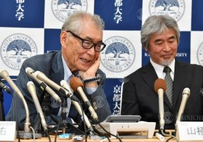 2018 Nobel Prize in Physiology or Medicine awarded to Tasuku Honjo and others Honjo press conference Tasuku Honjo, left, special professor at the University s Institute for Advanced Study, answers a congratulatory phone call during a press conference after being awarded the Nobel Prize in Physiology or Medicine. At right is President Juichi Yamaguchi at Kyoto University in Sakyo Ward, Kyoto, Japan, October 1, 2018, 8:04 p.m. Photo by Ai Kawahira.