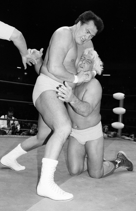 1987 All Japan Pro Wrestling Wajima clamps down on Ric Flair  right  for the NWA World Heavyweight Title at the All Japan Budokan, March 12, 1987  Date 19870312  Location Budokan