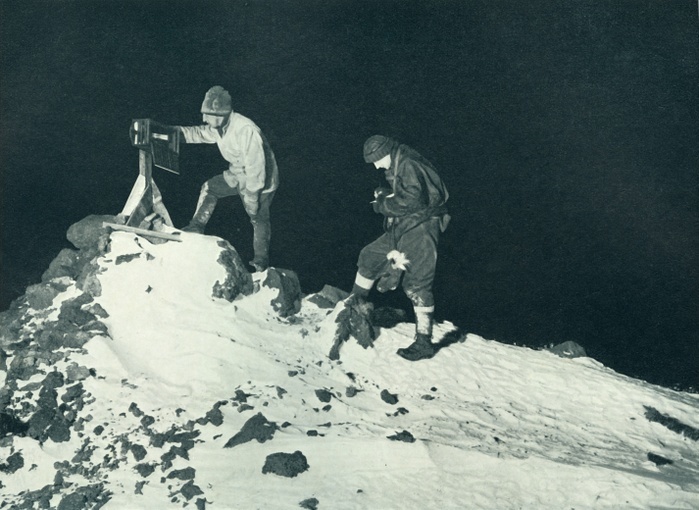  Dr. Wilson and Lieut. Bowers Reading The Ramp Thermometer , c1911,  1913 . Artist: Herbert Ponting. Dr. Wilson and Lieut. Bowers Reading The Ramp Thermometer in the Winter Night,   40  xb0  Fahr.  A flashlight photograph  , c1911,  1913 . Dr Edward Wilson  1872 1912  and Lieutenant Henry  Birdie  Bowers  1883 1912  died with Scott on the way back from the South Pole. The final expedition of British Antarctic explorer Captain Robert Falcon Scott  1868 1912  left London on 1 June 1910 bound for the South Pole. The Terra Nova Expedition, officially the British Antarctic Expedition  1910 1913 , included a geologist, a zoologist, a surgeon, a photographer, an engineer, a ski expert, a meteorologist and a physicist among others. Scott wished to continue the scientific work that he had begun when leading the Discovery Expedition to the Antarctic in 1901 04. He also wanted to be the first to reach the geographic South Pole. Scott, accompanied by Dr Edward Wilson, Captain Lawrence Oates, Lieutenant Henry Bowers and Petty Officer Edgar Evans, reached the Pole on 17 January 1912, only to find that the Norwegian expedition under Amundsen had beaten them to their objective by a month. Delayed by blizzards, and running out of supplies, Scott and the remainder of his team died at the end of March. Their bodies and diaries were found eight months later. From Scott s Last Expedition, Volume I.  Smith, Elder   Co., London, 1913 