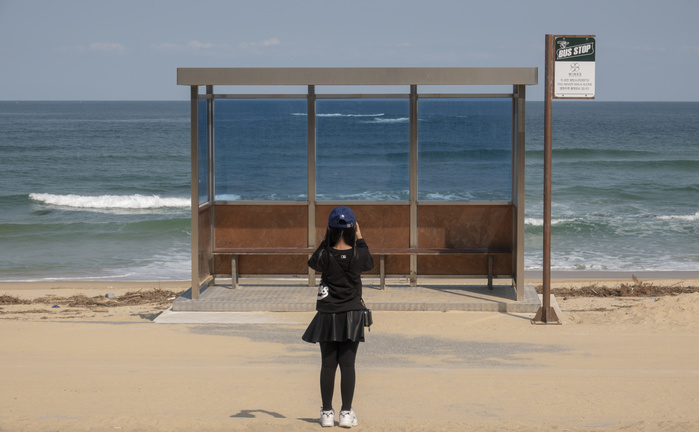 BTS Bus Stop is seen at Jumunjin beach in Gangneung BTS Bus Stop, Oct 9, 2018 :  BTS Bus Stop  is seen at Jumunjin beach in Gangneung, about 166 km  103 miles  east of Seoul, South Korea. BTS filmed the  You Never Walk Alone  album photos at the Jumunjin beach and the city of Gangneung recreated the bus stop featured on the cover of BTS  album. The BTS bus stop is not an actual stop for local buses but it is a photo zone for fans and tourists.  Photo by Lee Jae Won AFLO   SOUTH KOREA 