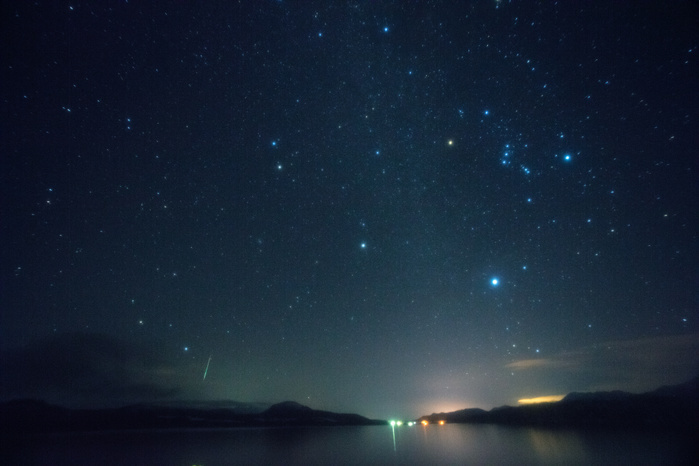 Winter Constellations and Geminids Meteor Shower Rising over Lake Kussharo, Hokkaido, Japan