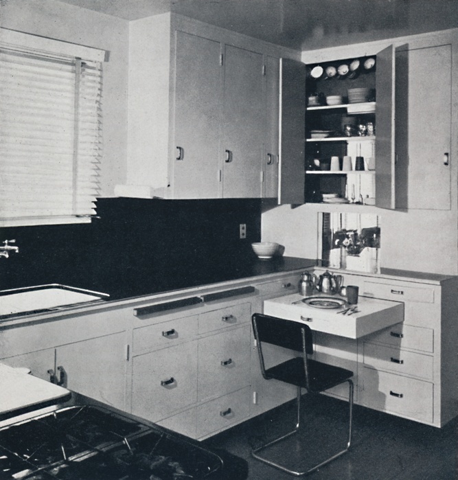  Honor Easton   The Kitchen In the house of Dr. Ian Campebell , 1940. Artist: Unknown.  Honor Easton   The Kitchen In the house of Dr. Ian Campebell, Pasadena, California  Architects, Erle Webster and Adrian Wilson  , 1940. Two way cupboard between kitchen and dining alcove,  greatly facilitates both the serving and clearing away of meals . From Decorative Art 1940   The Studio Year Book, edited by C. G. Holme.  The Studio Ltd., London, 1940 