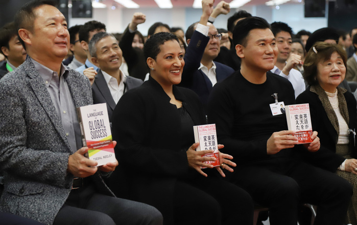 Rakuten Unveils Program to Make English Official Language October 24, 2018, Tokyo, Japan   Tsedal Neeley  2nd L  of Harvard Business School and Rakuten president Hiroshi Mikitani  2nd R  with Rakuten employees pose for photo after she gave a lecture about language and globalization to Japan s e commerce giant Rakuten employees at the Rakuten headquarters in Tokyo on Wednesday, October 24, 2018 as she published a book  The Language of Global Success   How a Common Tongue Transforms Multinational Organization  in English and Japanese. English is adopted for the official language in Rakuten several years ago.     Photo by Yoshio Tsunoda AFLO  LWX  ytd