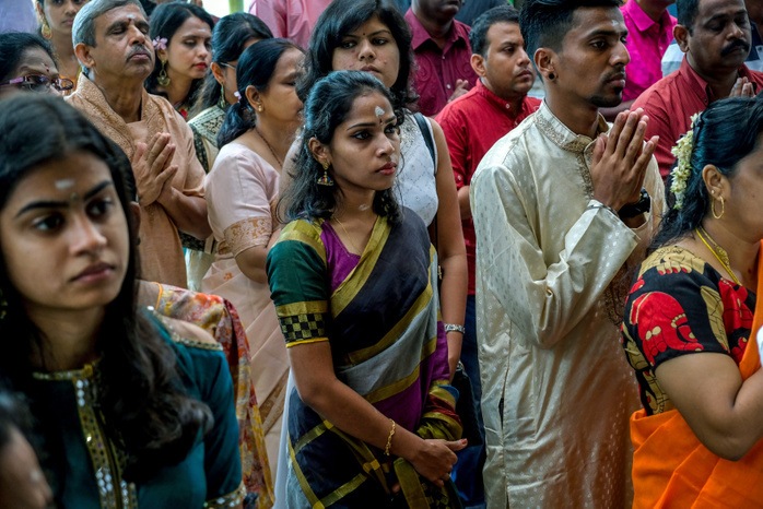 Hindu celebrated Diwali festivals in Malaysia Hindu perform a special prayer inside the temple during Diwali festivals on November 6, 2018 in Kuala Lumpur, Malaysia. Almost 6.4 percent Hindu populations in Malaysia celebrated Diwali, the festivals of light called  Deepavali  on November 6. The Hindu community, which consists of eight percent of Malaysia s population of 32 million, will celebrate Diwali, people light small oil lamps called diyas. It is believed that deceased relatives come back to visit their families on Earth during this festival and the lights are a way to guide the spirits home, the celebration revolves around the triumph of good over evil, purity over impurity, light over darkness. Photo by Samsul Said Aflo  MALAYSIA 