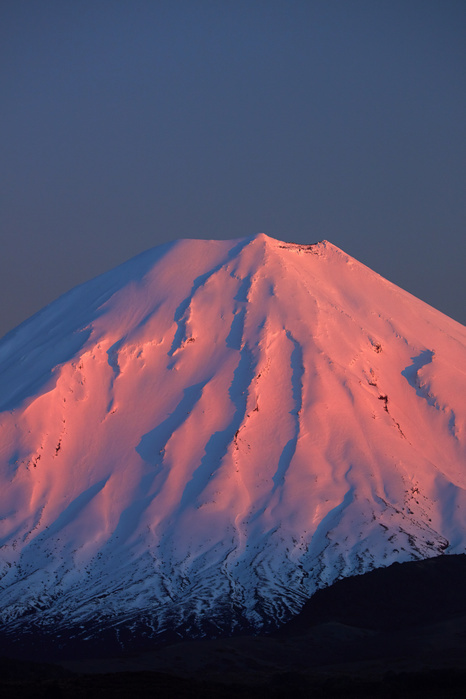 New Zealand Alpenglow on Mt Ngauruhoe at dawn, Tongariro National Park, Central Plateau, North Island, New Zealand