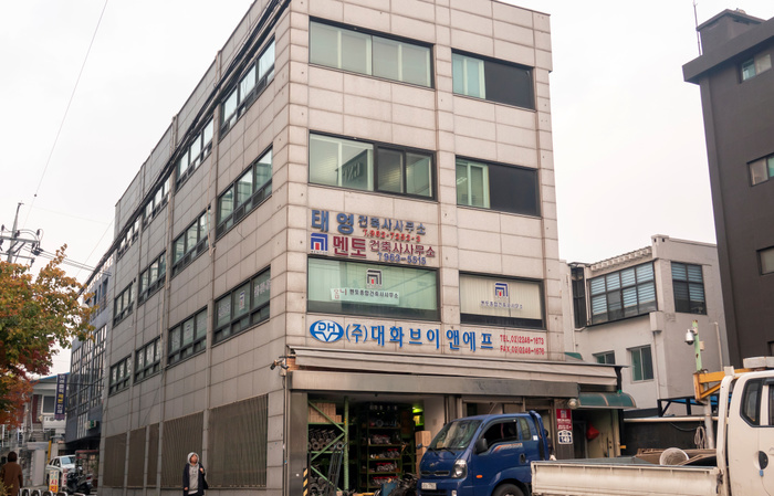 LJ company, the maker of local clothing brand Ourhistory in Seoul Korean clothing brand Ourhistory, Nov 9, 2018 : A building where LJ company, the maker of local clothing brand  Ourhistory  locates on the 3rd floor in Seoul, South Korea. Japanese television station TV Asahi s  Music Station  program has canceled an appearance by popular K pop boy band BTS citing controversy over a T shirt, made by the brand  Ourhistory , with an image of an atomic bomb that member Jimin wore last year to celebrate Korea s liberation from Japan after World War II. The T shirt had such English words as  Patriotism ,  Our History ,  Liberation  and  Korea  among black and white photos of a rising mushroom cloud made by an atomic bomb and of Koreans celebrating the end of Japan s colonial rule of Korea in 1945. Japan colonised the Korean Peninsula from 1910 to 1945.  Photo by Lee Jae Won AFLO   SOUTH KOREA 