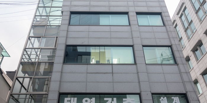 LJ company, the maker of local clothing brand Ourhistory in Seoul Korean clothing brand Ourhistory, Nov 9, 2018 : A building where LJ company, the maker of local clothing brand  Ourhistory  locates on the 3rd floor  C  in Seoul, South Korea. Japanese television station TV Asahi s  Music Station  program has canceled an appearance by popular K pop boy band BTS citing controversy over a T shirt, made by the brand  Ourhistory , with an image of an atomic bomb that member Jimin wore last year to celebrate Korea s liberation from Japan after World War II. The T shirt had such English words as  Patriotism ,  Our History ,  Liberation  and  Korea  among black and white photos of a rising mushroom cloud made by an atomic bomb and of Koreans celebrating the end of Japan s colonial rule of Korea in 1945. Japan colonised the Korean Peninsula from 1910 to 1945.  Photo by Lee Jae Won AFLO   SOUTH KOREA 