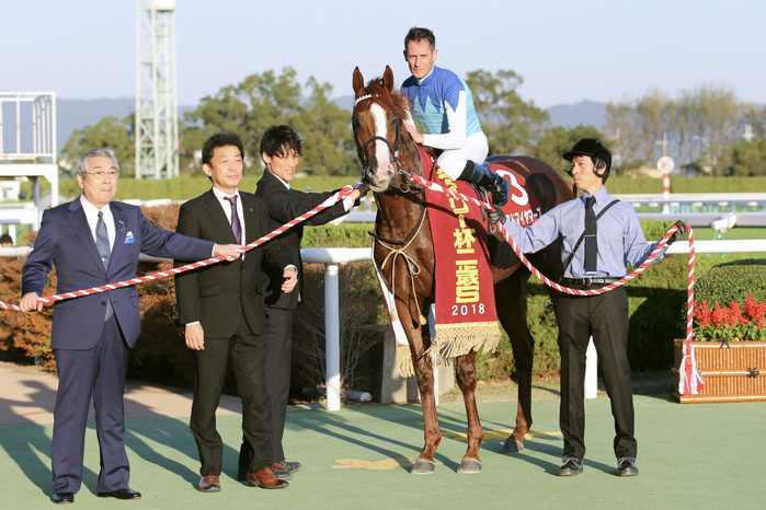 2018 Daily Cup 2 Year Old Stakes  G2  Admire Mars Won with an unblemished 3 consecutive wins Admire Mars  Mirco Demuro , Riichi Kondo, Yasuo Tomomichi, NOVEMBER 10, 2018   Horse Racing : Owner Riichi Kondo  L , trainer Yasuo Tomomichi  2nd L  and jockey Mirco Demuro pose with Admire Mars after winning the Daily Hai Nisai Stakes at Kyoto Racecourse in Kyoto, Japan.  Photo by Eiichi Yamane AFLO 