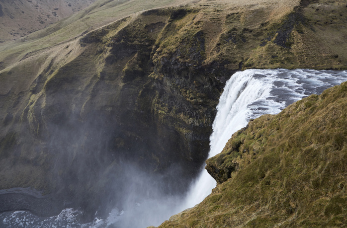 Iceland High angle scenic view of Skogafoss Waterfall on mountain