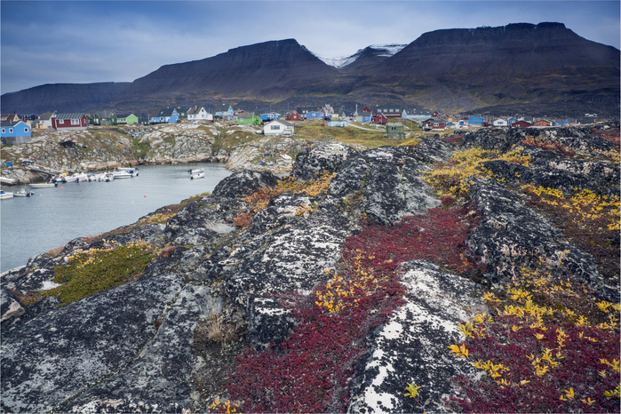 Colorful rocks along remote fishing village, Disko Island, Greenland