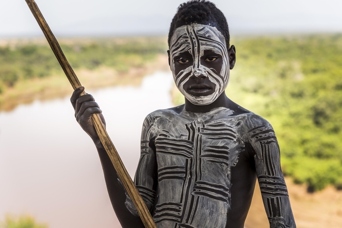 Boy from the Karo tribe, about 12 years, with body painting, Omo River, Southern Nations Nationalities and Peoples' Region, Ethiopia, Africa, Photo by Günter Lenz