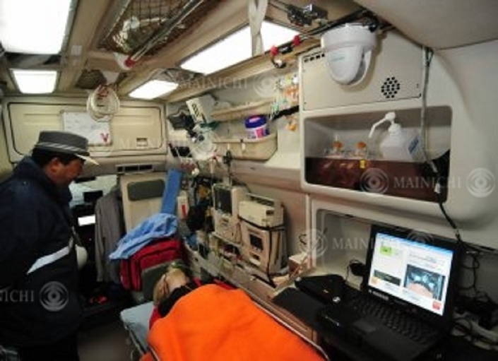 Using In vehicle IT in Ambulances Developed to Prevent Randalls System for  Establishment of an Emergency Medical System Using In vehicle IT  Developed to Prevent Randing   Gifu, A camera  upper right  mounted inside the ambulance reflects the patient s condition, and the image is sent to medical institutions via radio, at Gifu University Hospital in Yanagido, Gifu, Japan, March 15, 2010.
