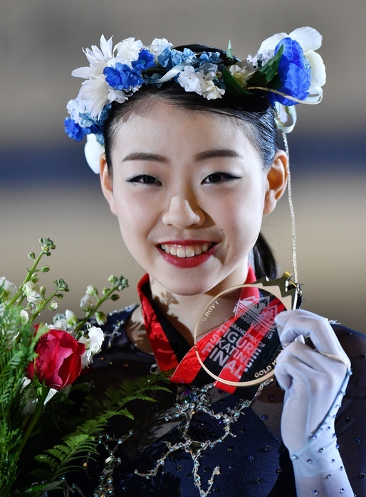 2018 GP Finals Women s Podium Ceremony Rika Kihira smiles with her gold medal after winning the Grand Prix Final, Doug Mitchell Thunderbird Sports Centre, Vancouver, British Columbia, Canada, December 8, 2018181208 photo date 20181208 location British Columbia, Canada Vancouver, BC, Canada