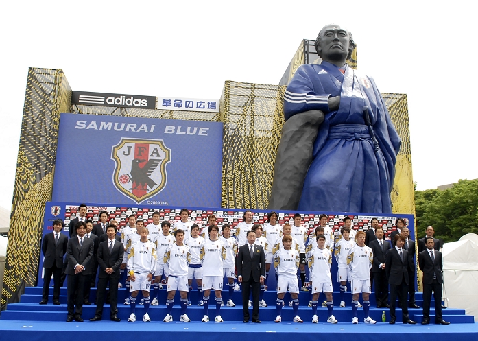 Japan national soccer team launching ceremony in front of Ryoma At Samurai Blue Park Japan team group and EXILE Japan team group and EXILE, May 22, 2010   Football : Japanese pop band and dance group EXILE and head coach Takushi Okada  C  poses for camera with 23 member squad for 2010 FIFA World Cup in South Africa during opening event for  Samurai Blue Park  in Tokyo, Japan, on May 22, 2010. 3620 