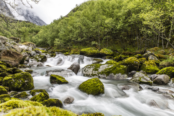 Snowmelt river running strongly in Briksdal Valley, Olden, Norway. Snowmelt river running strongly in Briksdal Valley, Olden, Norway, Scandinavia, Europe, Photo by Michael Nolan