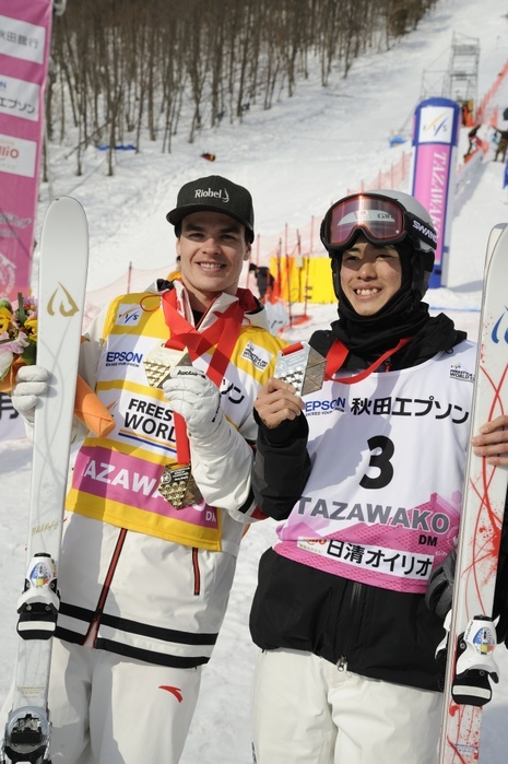 2018 19 FIS Freestyle Ski World Cup First place Mikael Kingsbury of Canada, right, and second place Ikuma Horishima of Japan pose during the 2018 19 FIS Freestyle Ski World Cup Men s Dual Moguls award ceremony in Tazawako, Akita, Japan on February 24, 2019.  Photo by Hiroyuki Sato AFLO 