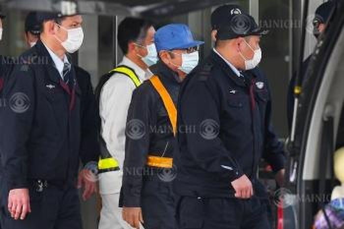 Carlos Ghosn released on bail, disguised as a worker. Carlos Ghosn  center  leaves the Tokyo Detention Center in Katsushika Ward, Tokyo, Japan, March 6, 2019, 4:31 p.m. Photo by Naoki Watanabe.