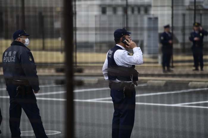 Japan Nissan Ghosn TOKYO, JAPAN   MARCH 6: Police are seen in front of Tokyo Detention Center as they prepare for the release of former Nissan Chairman Carlos Ghosn, March 6, 2019, in Tokyo, Japan. The Tokyo District Court approved the release of Mr. Ghosn on 1 billion yen  US  9 million  bail on Tuesday, ending nearly four months of detention.  Photo: Richard Atrero de Guzman Aflo 
