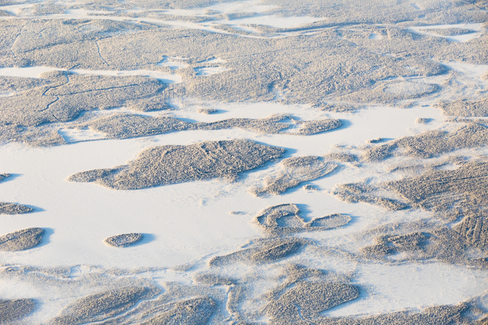 Aerial view of forest and hills in the frozen landscape, Levi, Kittila, Lapland, Finland Aerial view of forest and hills in the frozen landscape, Levi, Kittila, Lapland, Finland, Europe, Photo by Roberto Moiola