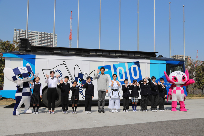 Tokyo 2020 Olympic Games 500 Days Ahead Event: 500days Cargo Unveiling   Departure Ceremony March 12, 2019, Tokyo, Japan   Rio de Janeiro Olympic 4x100 relay silver medalist Shota Iizuka  C, L  and karateka Kiyo Shimizu  C, R , accompanied by school children and mascots Miraitowa  L  and Someity pose before a wrapping bus for the promotion of the Tokyo 2020 Olympic Games in Tokyo on Tuesday, March 12, 2019. The bus with logo of the 500days to go for Tokyo 2020 Olympics started a caravan for the promotion of the next year s Summer Games.     Photo by Yoshio Tsunoda AFLO 