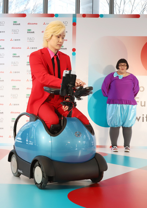 Next generation mobility  Rodem  demonstration test March 18, 2019, Tokyo, Japan   Japanese comedy duo Maple Superalloy members Natsu Ando  R  and Kazlaser  L  attend a presentation of Japanese robot company tmsuk s personal mobility  Rodem  in Tokyo on Monday, March 18, 2019. NTT Docomo, Mitsubishi Estate and tmsuk started a field test to drive Rodem on the road in Marunouchi for sightseers.     Photo by Yoshio Tsunoda AFLO 